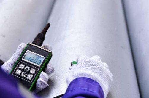 Technician performing ultrasonic testing